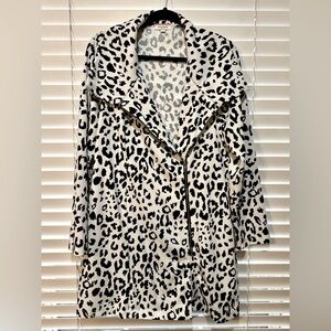 Black and white animal print, lightweight, long sleeve ladies jacket.